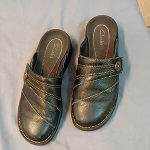 Clarks Women's Black Leather Mules with Stitch Detail